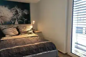 Guetsel Lodge Appartements, Гютерсло