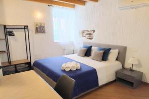 Holmann Suite Rooms, Ольбия