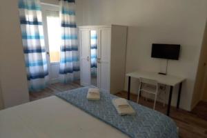 Iris Rooms, Кальяри
