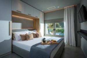 Malia Palace by Luxury Living Apartments, Коккини-Хани