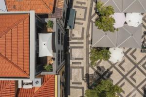 Apartamentos na Praça by An Island Apart, Фуншал