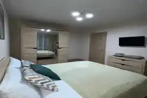 Апартаменты рядом с лесом, Ветряк