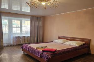 Квартира Уютная студия с балконом в центре города