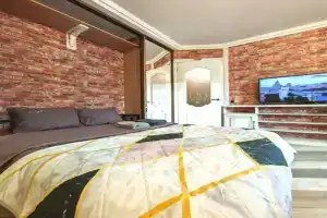 Квартира Уютная студия в шаговой доступности от метро