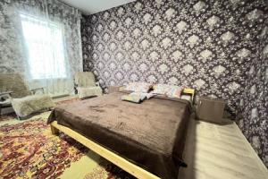 Апартаменты двухкомнатные NHome Деревянное зодчество, Томск
