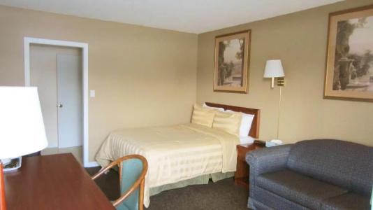 Village Inn & Suites - - 17