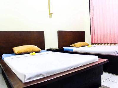 Budhi Beach Inn - 1