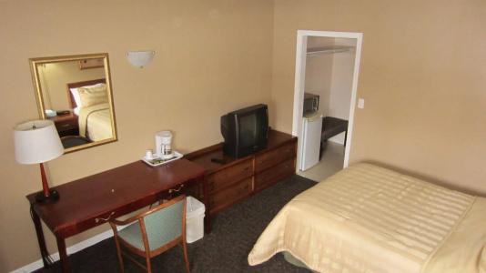 Village Inn & Suites - - 7