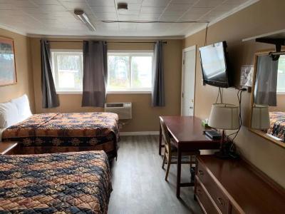Village Inn & Suites - - 19