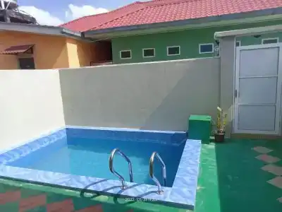 Tokman Inn - 105