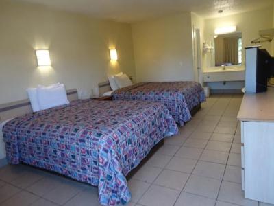 Super 6 Inn & Suites - 1