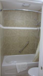 Village Inn & Suites - - 11