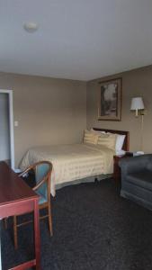 Village Inn & Suites - - 6