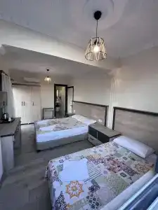 Yücel - 49