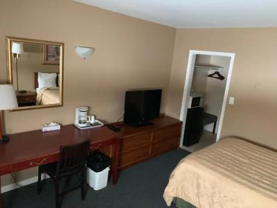 Village Inn & Suites - - 15