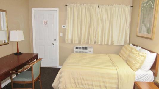 Village Inn & Suites - - 3