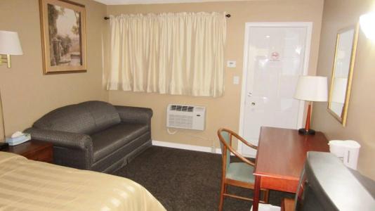 Village Inn & Suites - - 4