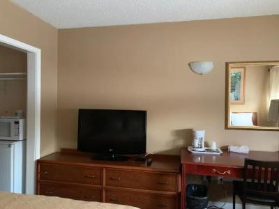 Village Inn & Suites - - 14