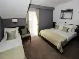 Трёхместный номер Стандарт с балконом