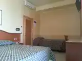 Четырёхместный номер Стандарт с балконом