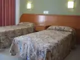Четырёхместный номер Стандарт с балконом