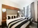 Трёхместный номер Deluxe