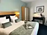 Трёхместный номер Deluxe