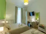 Трёхместный номер Стандарт с балконом