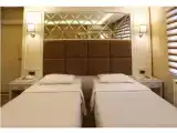 Трёхместный номер Deluxe