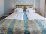 Двухместный коттедж