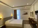 Трёхместный номер Deluxe