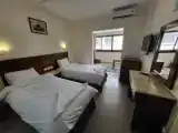 Трёхместный номер Deluxe