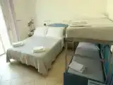 Четырёхместный номер Стандарт с балконом