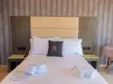 Трёхместный номер Deluxe с балконом и с видом на море