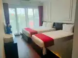 Трёхместный номер Deluxe