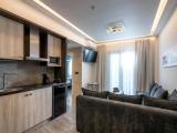 Номер Deluxe c 1 комнатой с балконом и с видом на бассейн
