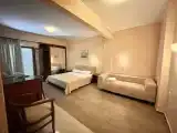 Четырёхместный номер Стандарт с балконом