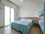 Четырёхместный номер Стандарт с балконом
