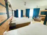 Четырёхместный номер Deluxe с балконом