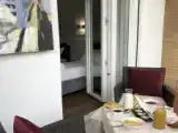 Трёхместный номер Deluxe с балконом