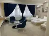Трёхместный номер Deluxe с балконом и с видом на город