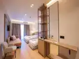 Четырёхместный номер Deluxe с балконом и с видом на море