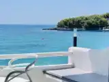 Трёхместный номер Deluxe с балконом и с видом на море