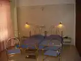 Четырёхместный номер Стандарт с балконом