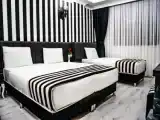 Трёхместный номер Deluxe