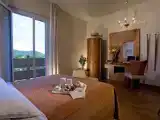 Трёхместный номер Стандарт с балконом