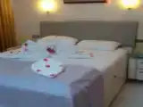 Трёхместный номер Стандарт с балконом и с частичным видом на море