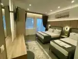 Трёхместный номер Стандарт с балконом