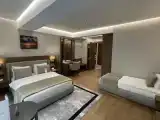 Трёхместный номер Deluxe