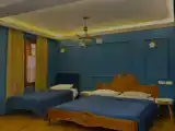 Трёхместный номер Deluxe